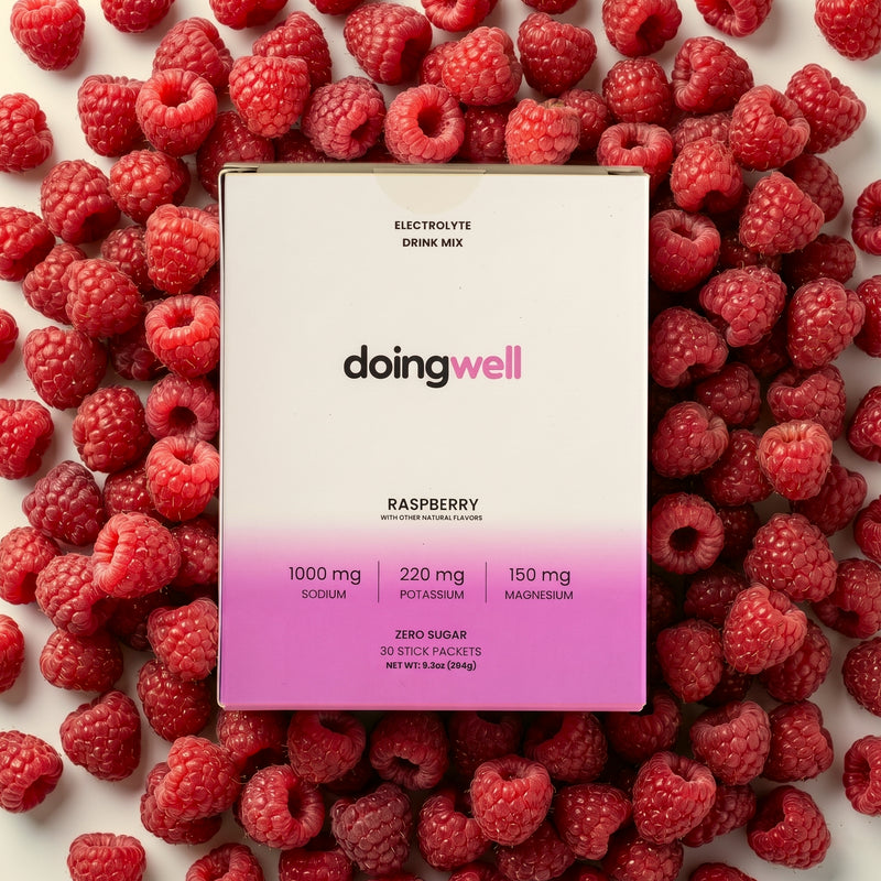 doingwell Raspberry electrolyte stick packs and box — 1,000mg sodium, zero sugar, organic monk fruit sweetened