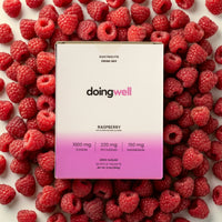 doingwell Raspberry electrolyte stick packs and box — 1,000mg sodium, zero sugar, organic monk fruit sweetened