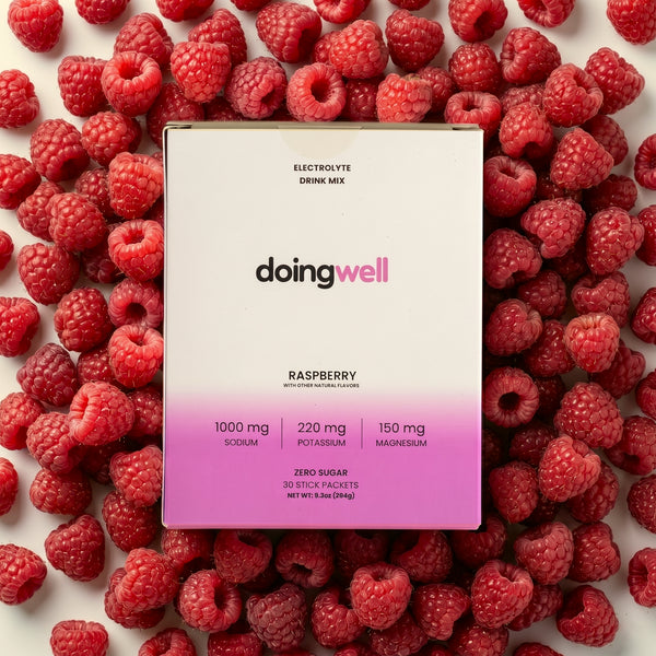 doingwell Raspberry electrolyte stick packs and box — 1,000mg sodium, zero sugar, organic monk fruit sweetened