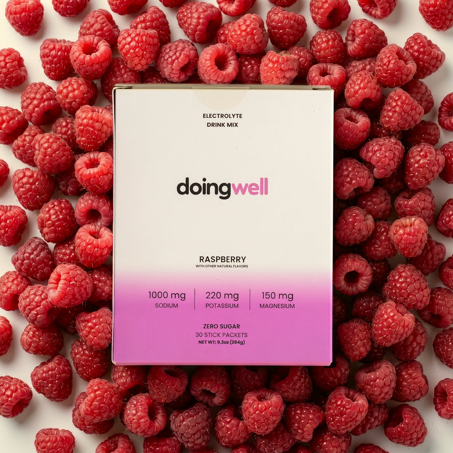 doingwell Raspberry electrolyte stick packs and box — 1,000mg sodium, zero sugar, organic monk fruit sweetened