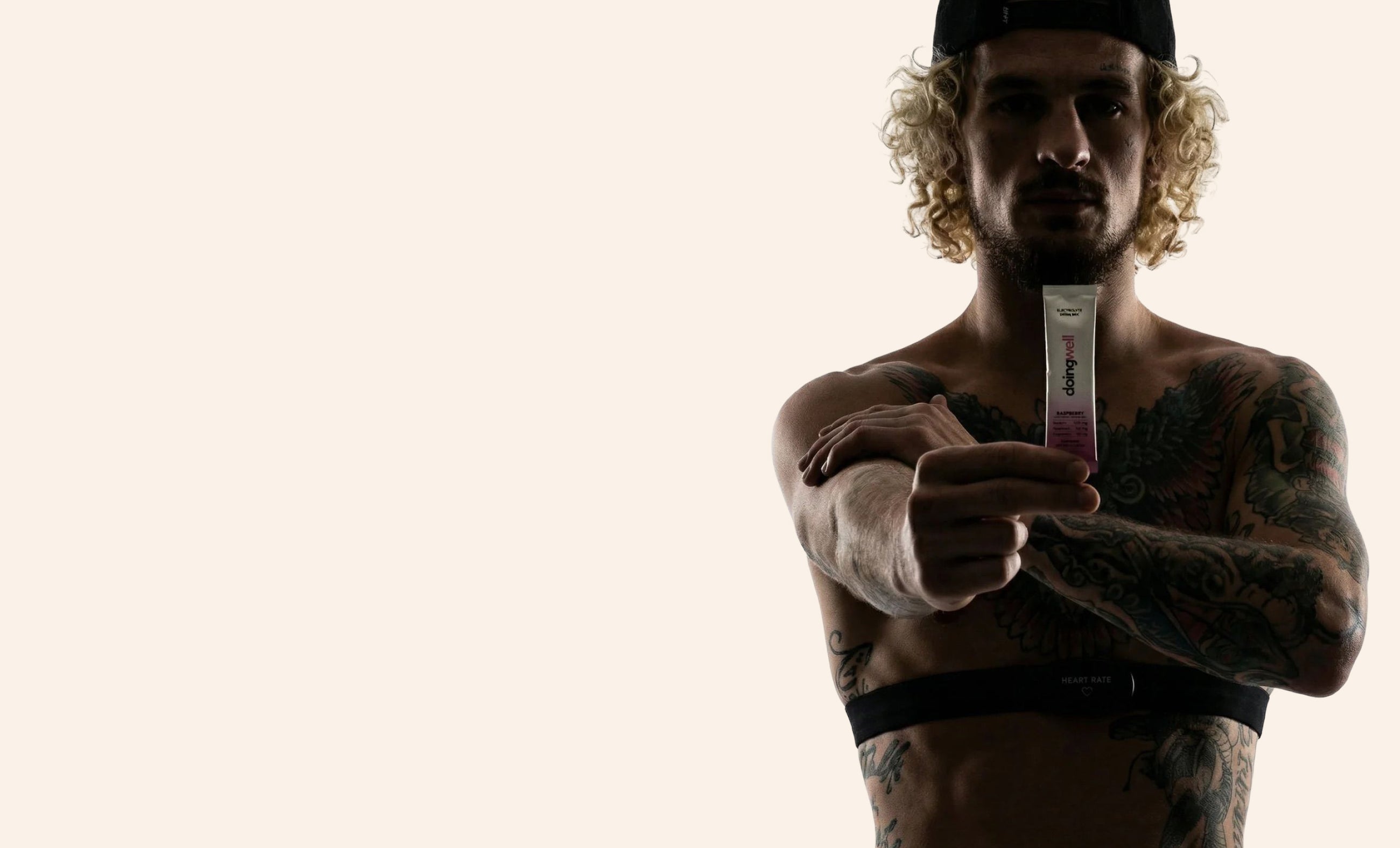 Sean O'Malley holding DoingWell electrolyte products